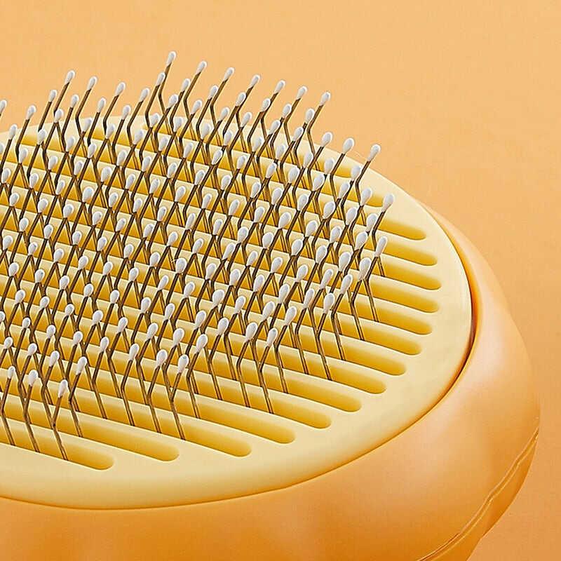Brosse auto-nettoyante citrouille pour chat | AutoCleaner™ - MyPetsHub